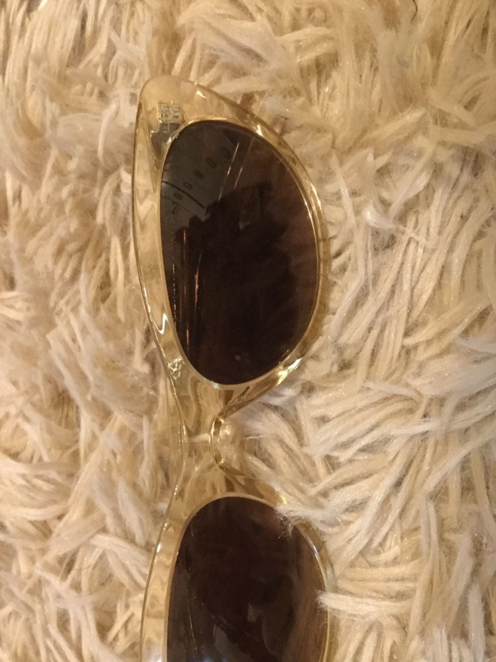 Warby Parker sunglasses in see through peachy color